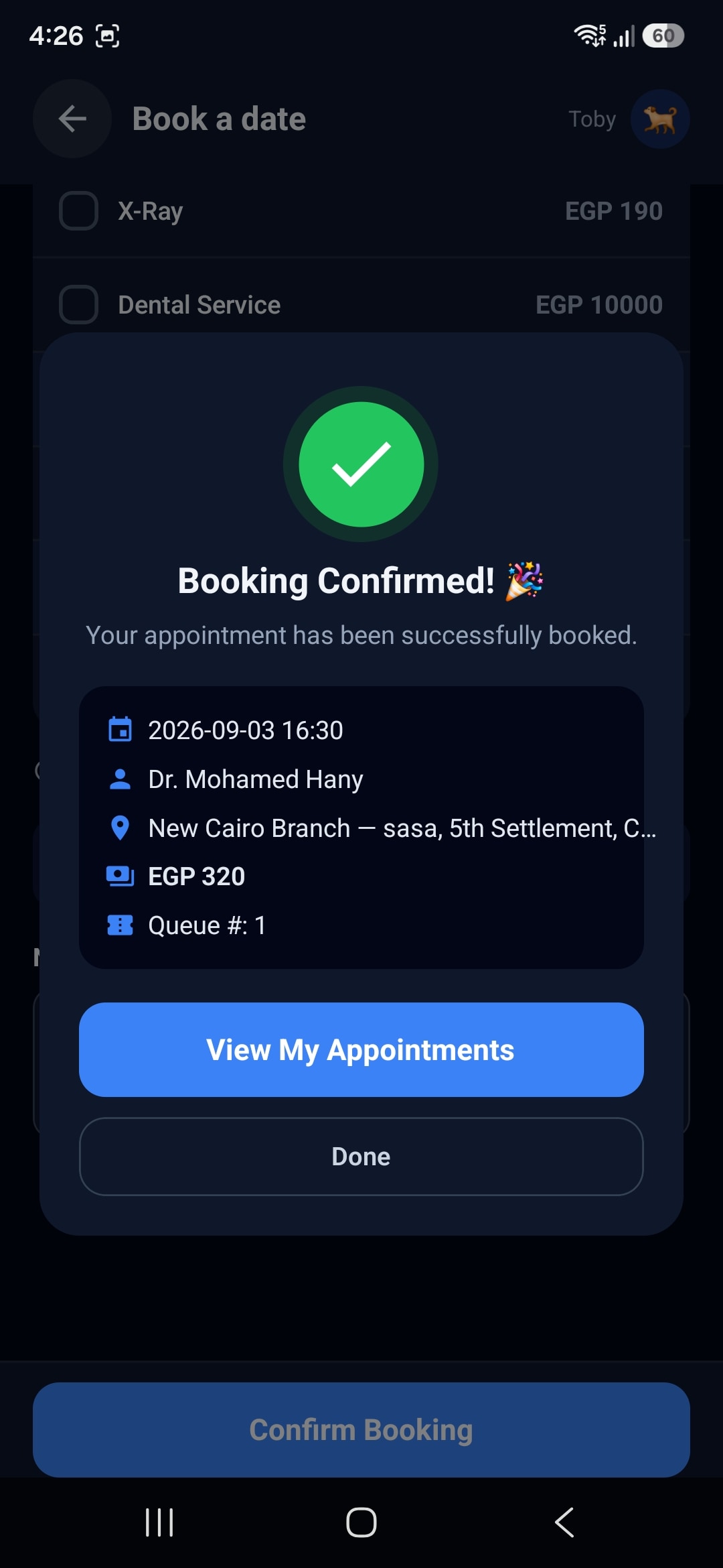 PawPal app confirmation for a booked veterinary visit showing the date, veterinarian, branch, total, and queue number